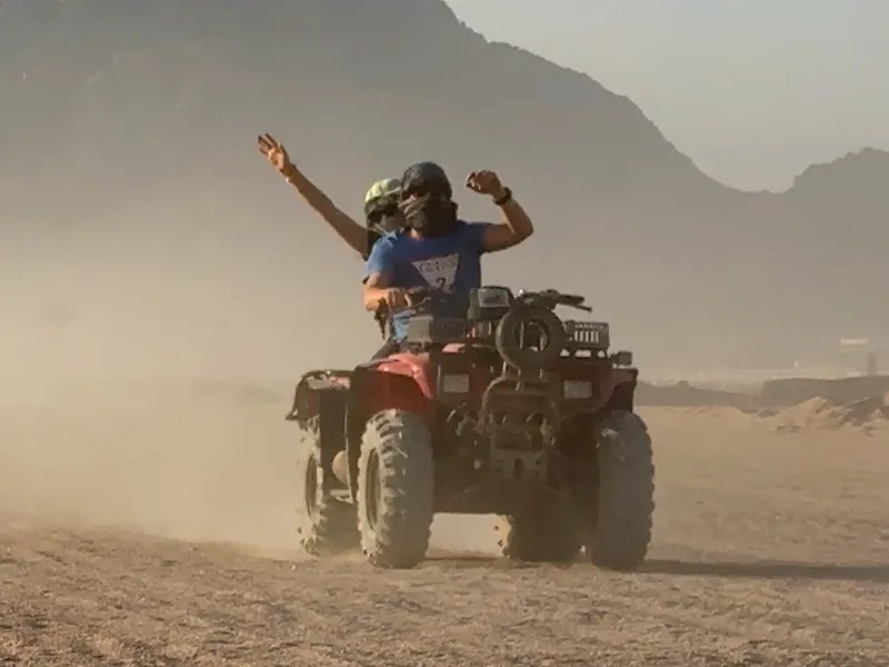 riding quad bikes in the Sharm El Sheikh desert during a Super Safari tour