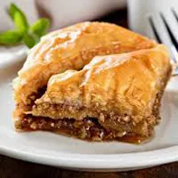 Traditional Greek Baklava with honey and nuts at Koutouki Greek Restaurant Soho Square Sharm El Sheikh