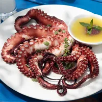 Chtapodi Psito traditional grilled octopus at Koutouki Greek Restaurant Soho Square Sharm El Sheikh