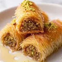 Kataifi traditional Greek pastry with shredded phyllo, nuts, and syrup at Koutouki Restaurant Soho Square Sharm El Sheikh