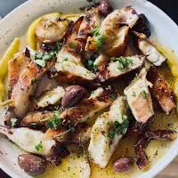 Kotopoulo Kalderas Sandorinis Santorini style chicken at Koutouki Greek Restaurant Soho Square Sharm El Sheikh