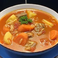 Kreatosoupa traditional Greek meat soup at Koutouki Restaurant Soho Square Sharm El Sheikh