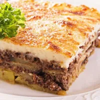 Traditional Moussakas layered eggplant and meat at Koutouki Greek Restaurant Soho Square Sharm El Sheikh