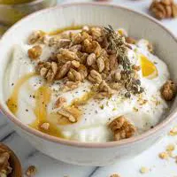Yiaourti me meli kai karidia Greek yogurt with honey and walnuts at Koutouki Restaurant Soho Square Sharm El Sheikh