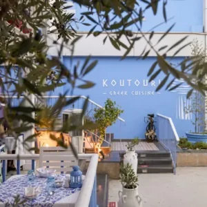 Exterior view of Koutouki restaurant in the heart of Soho Square nightlife district